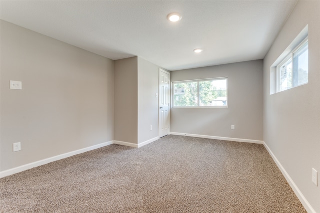 view of carpeted spare room