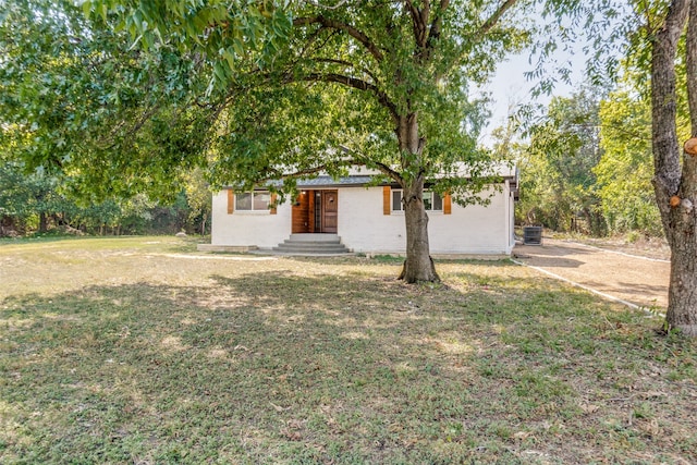 exterior space with a front yard