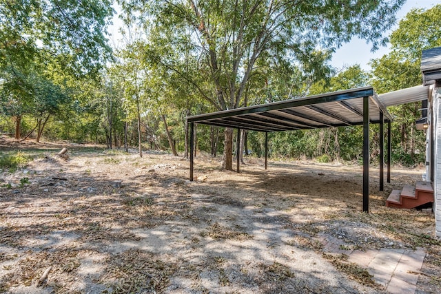 view of yard featuring a carport