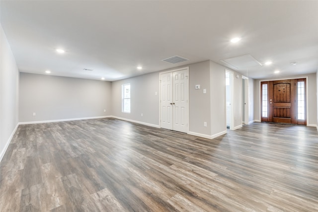 interior space with dark hardwood / wood-style flooring