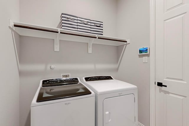 laundry room featuring independent washer and dryer