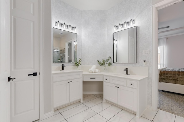 bathroom featuring vanity and an enclosed shower