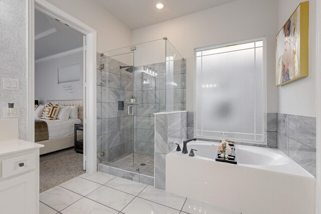 bathroom with tile patterned floors, separate shower and tub, and ornamental molding