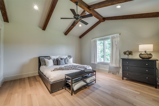 bedroom featuring beam ceiling, light wood-type flooring, high vaulted ceiling, and ceiling fan