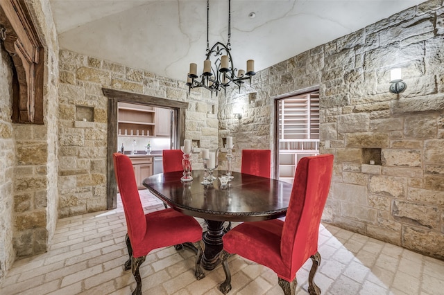 dining area featuring a chandelier