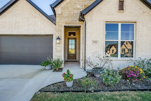 property entrance with a garage