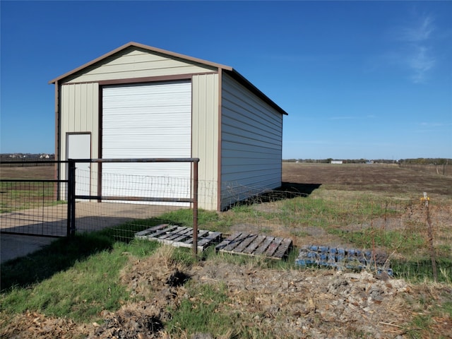 view of outbuilding featuring a garage