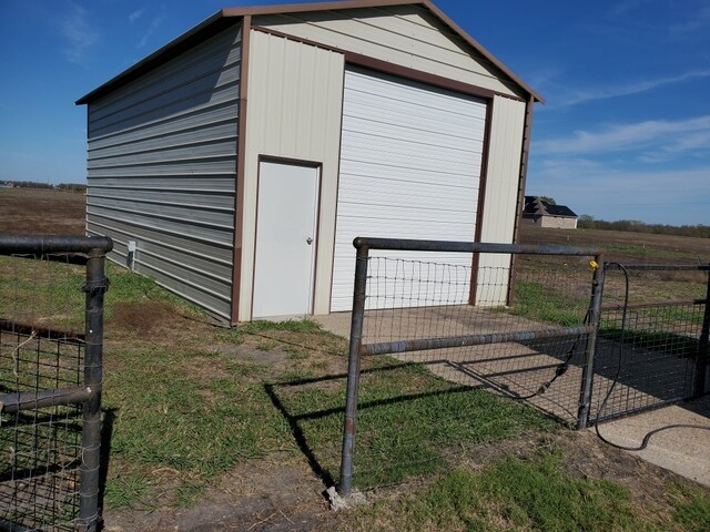 view of outbuilding with a garage