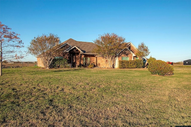 view of front facade with a front yard