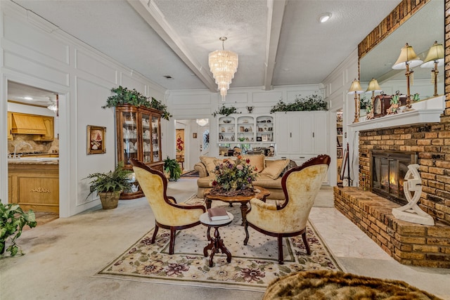 dining space featuring beam ceiling, a textured ceiling, light carpet, and a brick fireplace