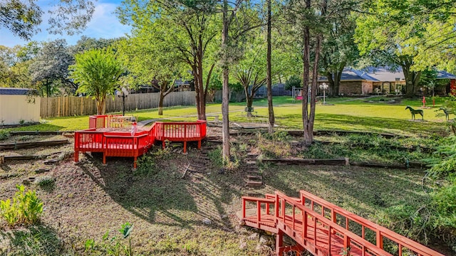 view of yard featuring a wooden deck