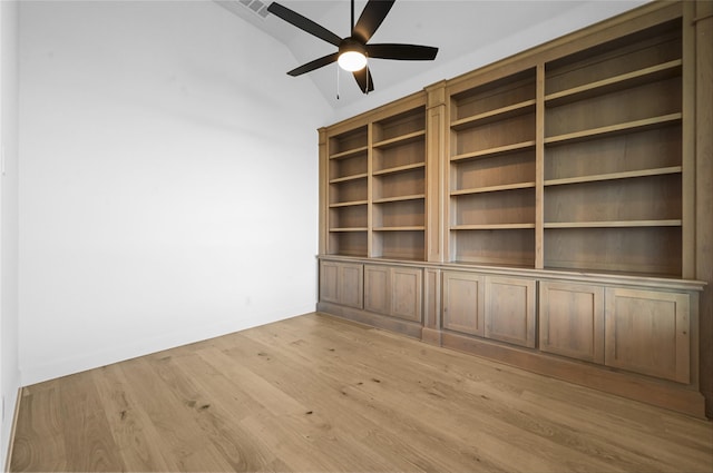 unfurnished living room with ceiling fan, light hardwood / wood-style flooring, and lofted ceiling