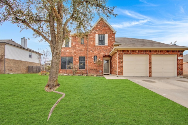 view of front of house with a front yard and a garage