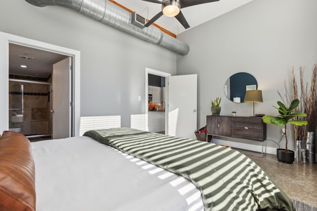 bedroom featuring ensuite bathroom and ceiling fan