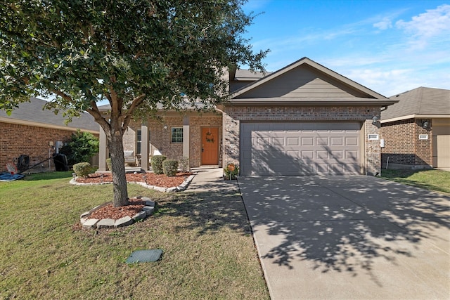 view of front of house with a garage and a front lawn