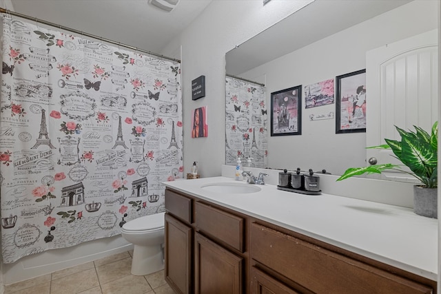 full bathroom featuring tile patterned flooring, vanity, shower / tub combo with curtain, and toilet