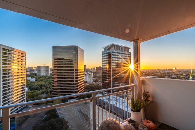 view of balcony at dusk