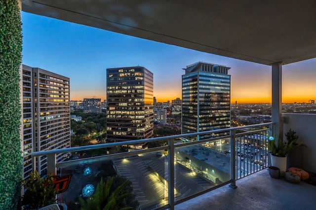 view of balcony at dusk