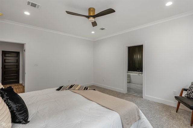 bedroom with ceiling fan, ornamental molding, carpet floors, and ensuite bath