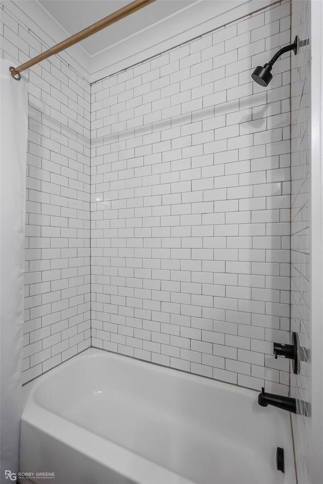 bathroom featuring shower / tub combo with curtain