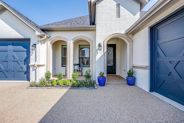 property entrance with a garage