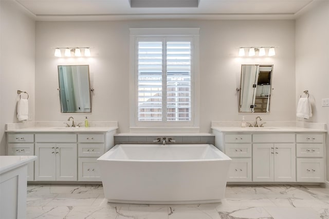 bathroom featuring vanity and a tub to relax in