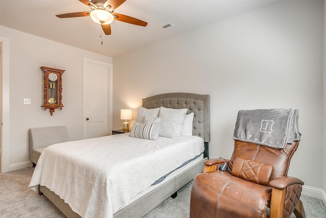 bedroom with light carpet and ceiling fan