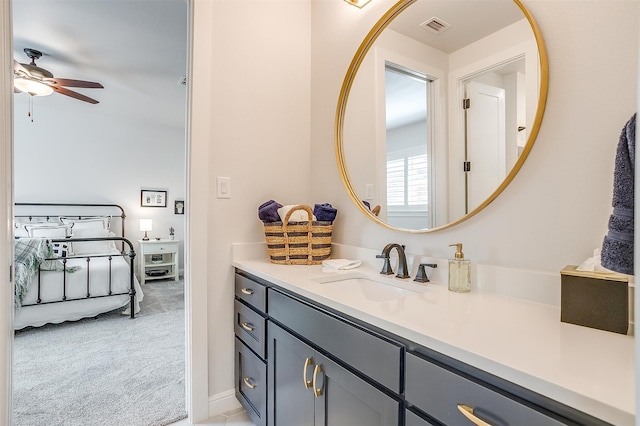 bathroom with vanity and ceiling fan