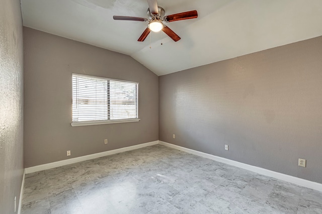 unfurnished room featuring ceiling fan and vaulted ceiling