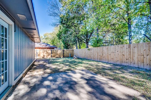 view of yard with a patio area