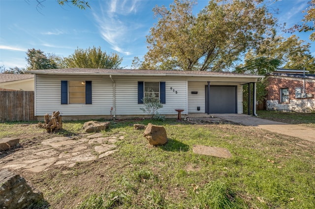 ranch-style home with a garage and a front lawn