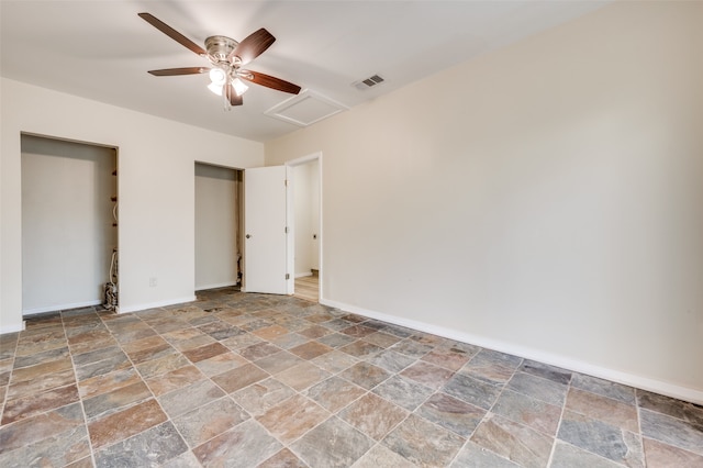 unfurnished bedroom featuring ceiling fan