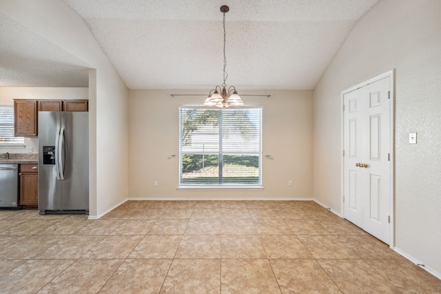 unfurnished dining area featuring a textured ceiling, light tile patterned floors, lofted ceiling, and an inviting chandelier