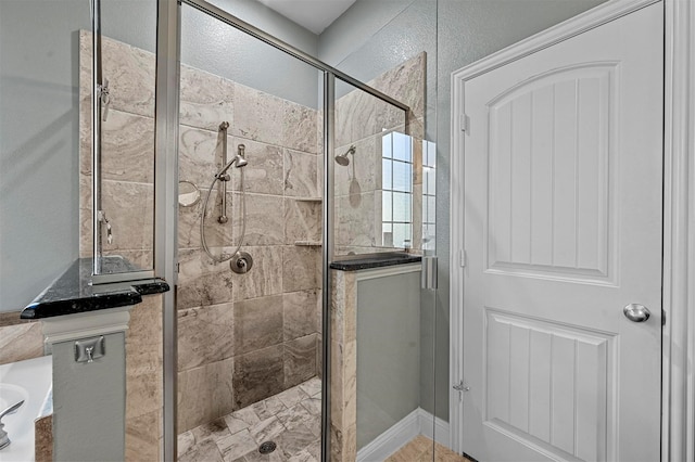 bathroom with a shower stall and a bathing tub