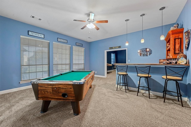 playroom with light colored carpet, baseboards, visible vents, and a bar