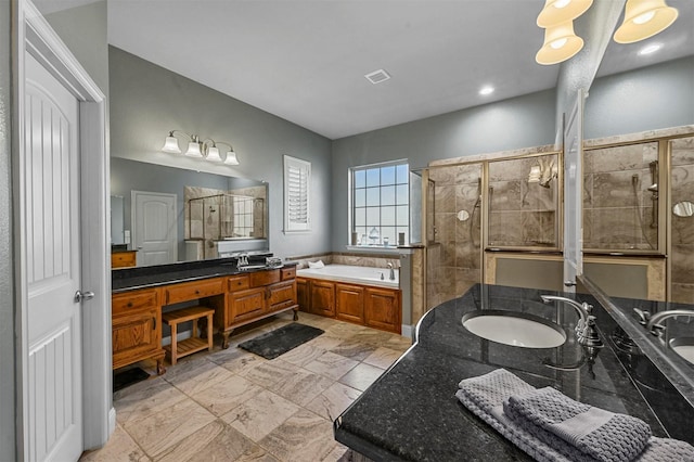 bathroom with marble finish floor, visible vents, vanity, tiled shower, and a bath