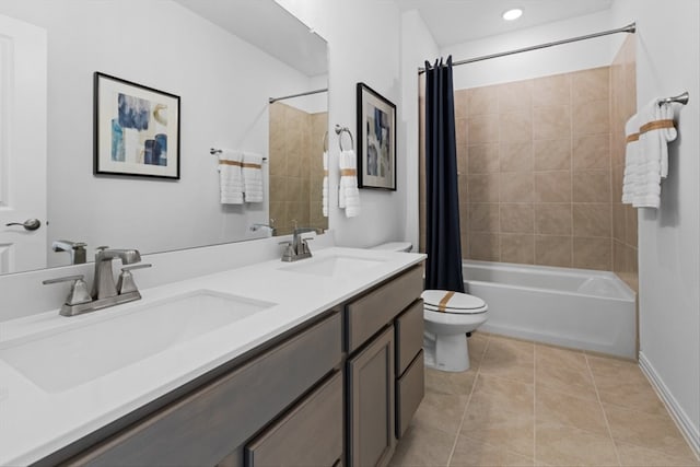 full bathroom with tile patterned floors, vanity, shower / bath combo, and toilet