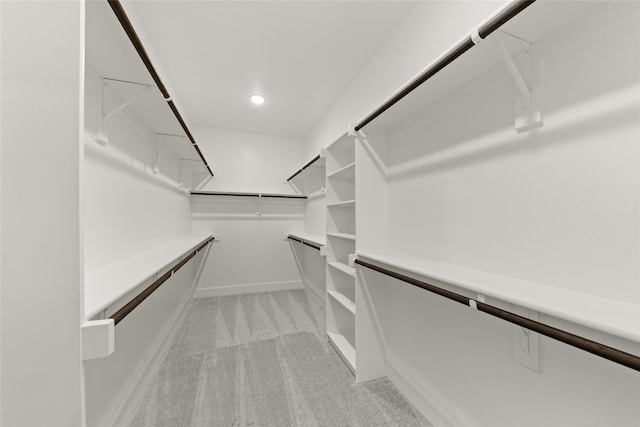 724 Stearman Ln, Fate, TX 75087 - walk in closet featuring light colored carpet