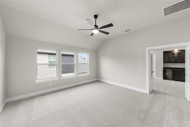 724 Stearman Ln, Fate, TX 75087 - unfurnished room with light colored carpet, a ceiling fan, and vaulted ceiling