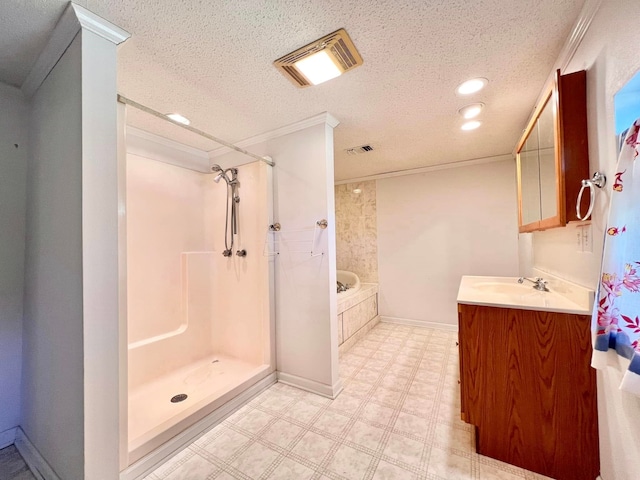 bathroom with crown molding, vanity, independent shower and bath, and a textured ceiling