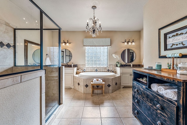 bedroom featuring light wood-type flooring, ensuite bathroom, ceiling fan, and lofted ceiling