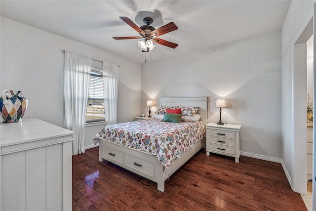 bedroom with ceiling fan and dark hardwood / wood-style floors