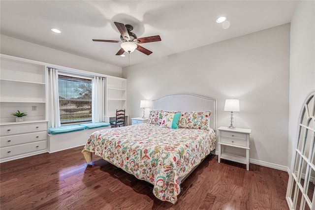 bedroom featuring dark hardwood / wood-style floors and ceiling fan