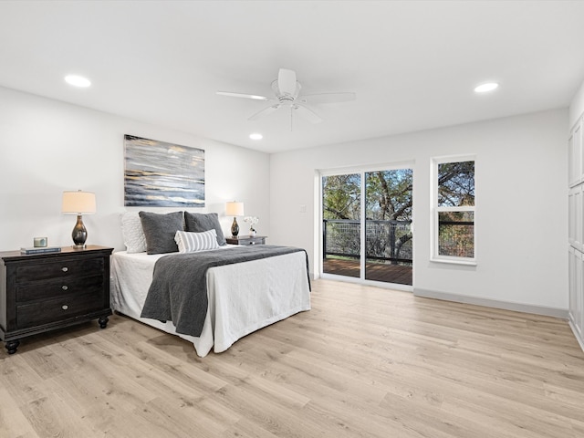 bedroom featuring access to outside, ceiling fan, and light hardwood / wood-style flooring