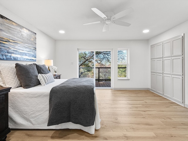 bedroom with ceiling fan, access to outside, and light hardwood / wood-style flooring