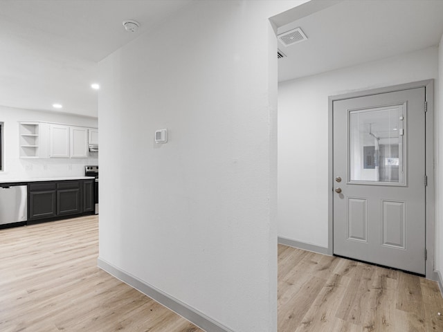 interior space with light hardwood / wood-style floors