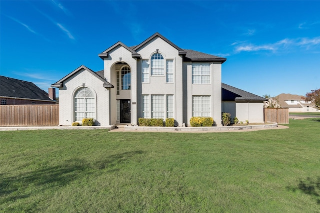 view of front of home featuring a front yard