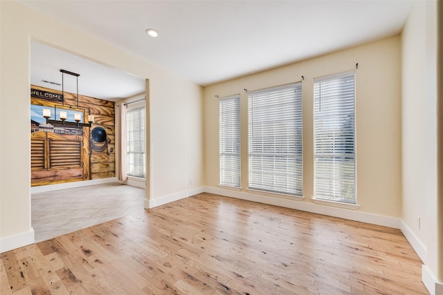 unfurnished room featuring light hardwood / wood-style flooring