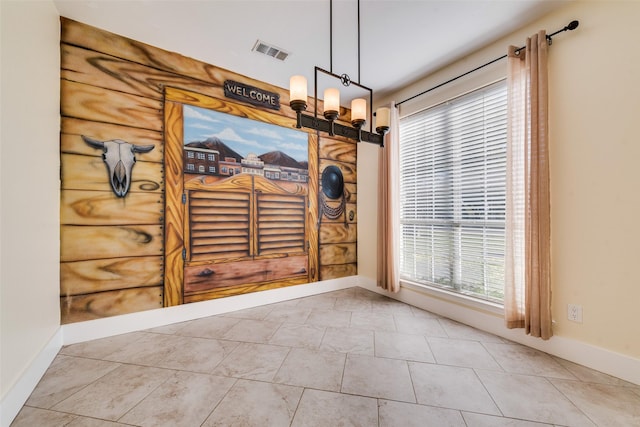 interior space with tile patterned flooring