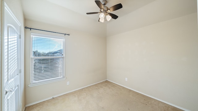 unfurnished room featuring ceiling fan and light colored carpet